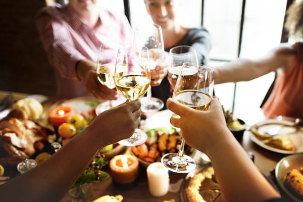 friends cheering with wine