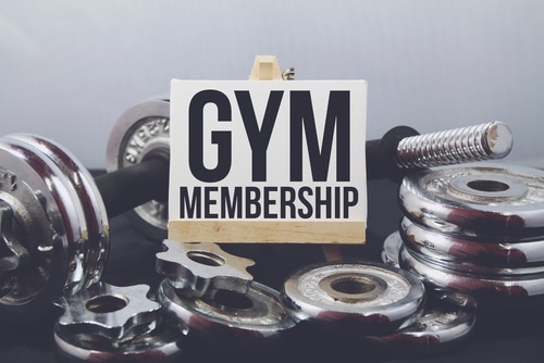 A sign with the word gym membership on it.