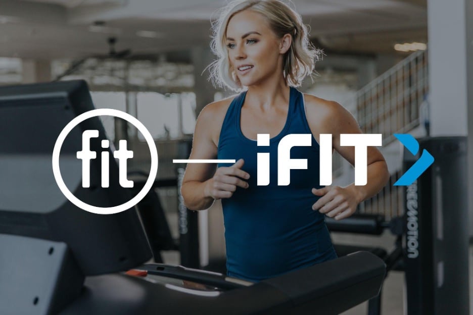 A woman running on a treadmill with the word fit.